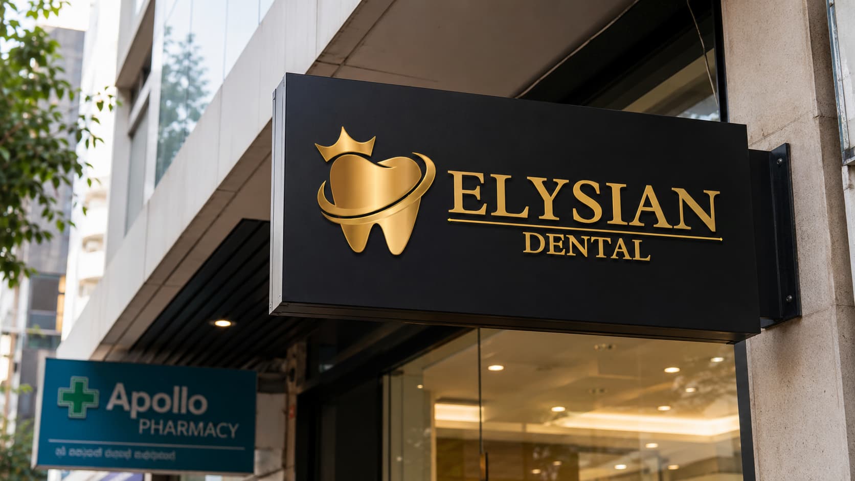 Elysian Dental Care clinic signage above Apollo Pharmacy, Kondapur